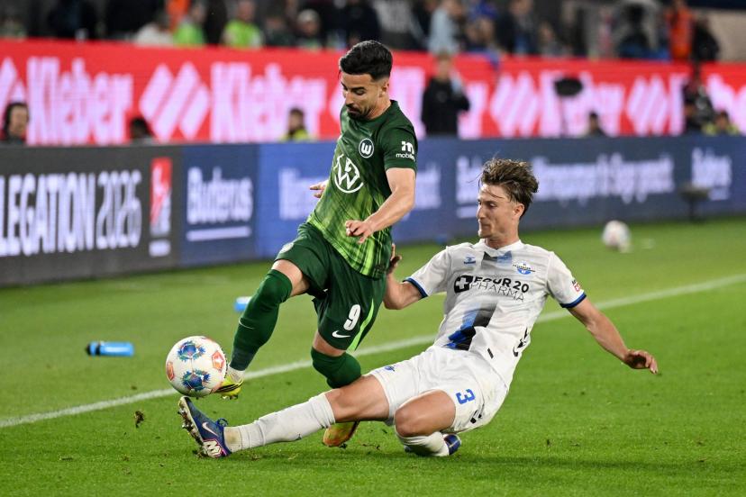 The Wolfsburg side featuring Mohammed Amoura was held by Paderborn's Jonah Sticker on Thursday. (Teresa Kroeger/Reuters)