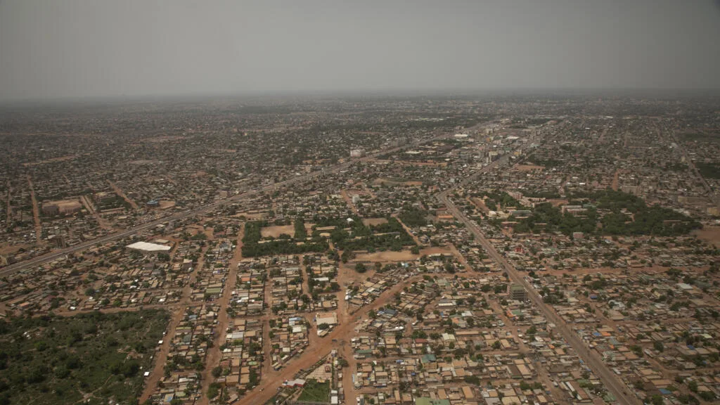 Protesters holding signs during a demonstration in Ouagadougou