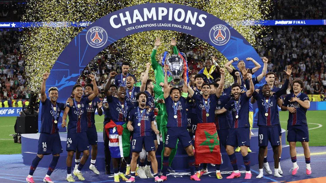 PSG players lift the Champions League trophy for the second straight year