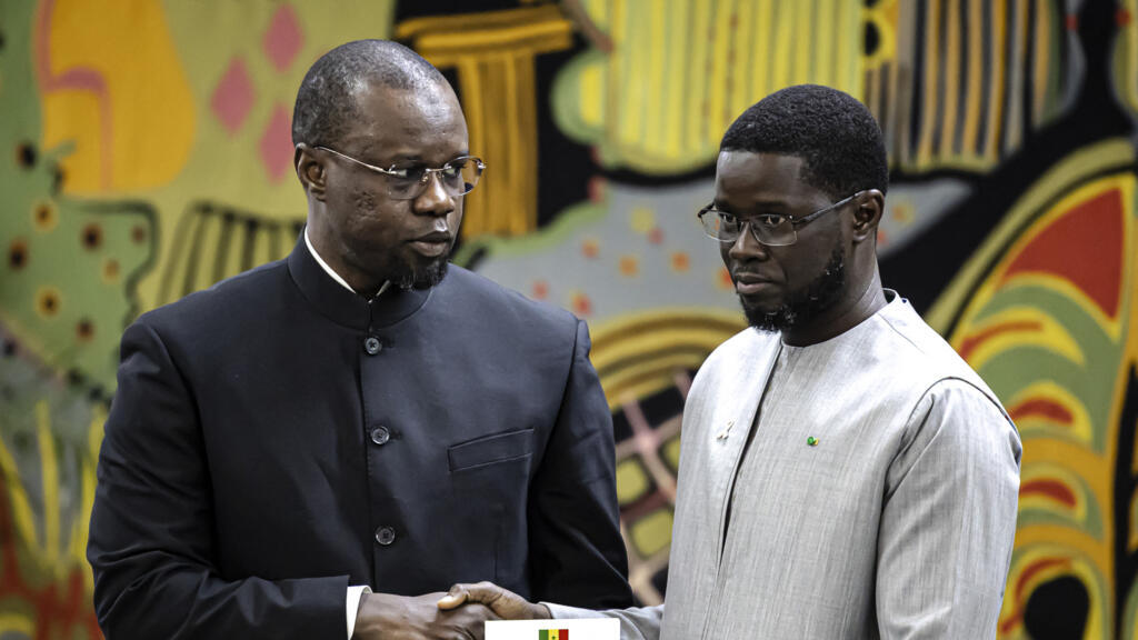 Ousmane Sonko (left) and President Bassirou Diomaye Faye (right) at the Dakar presidential palace on October 16, 2025.