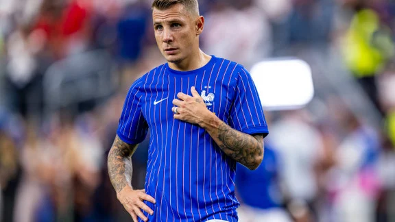 Lucas Digne wearing Aston Villa kit
