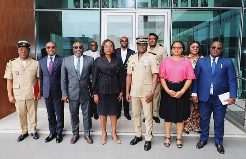 Government officials reviewing fiscal and customs documents
