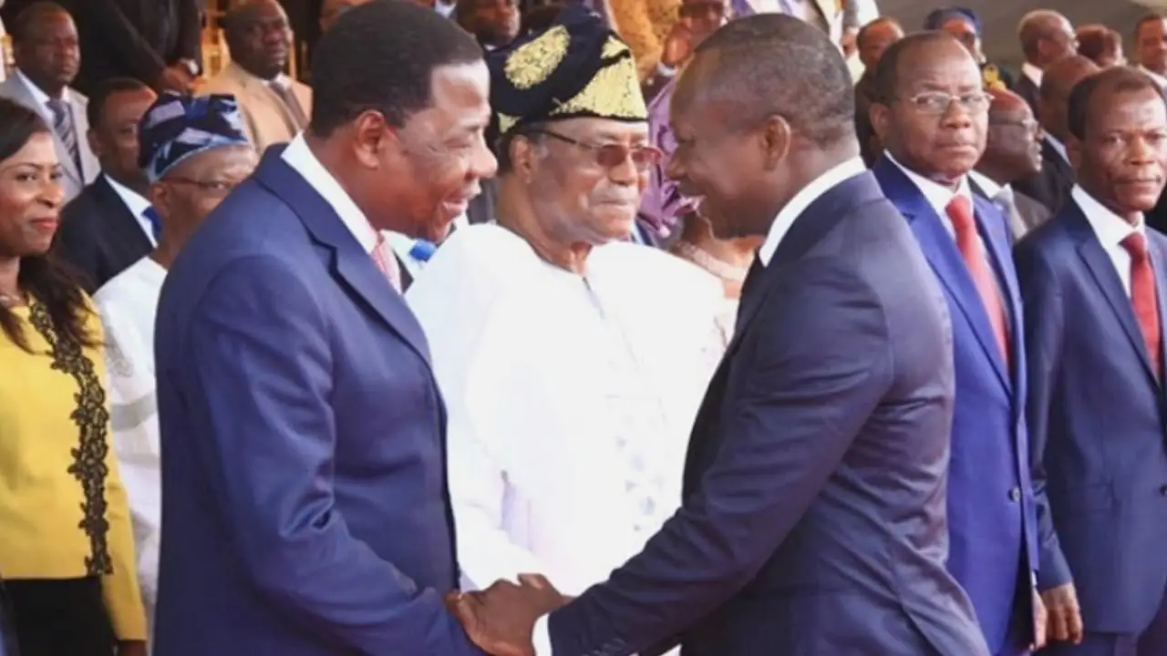 Former presidents Nicéphore Soglo (background), Boni Yayi (left), and Patrice Talon (right)